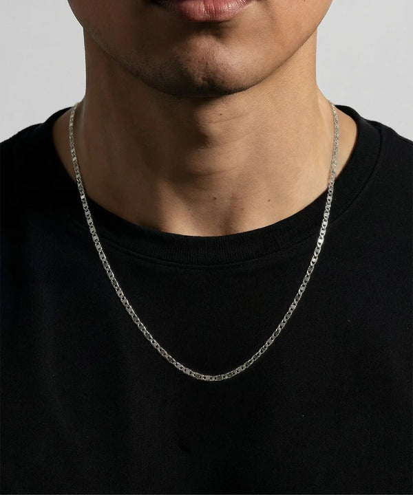 Close-up of Valentino chain links