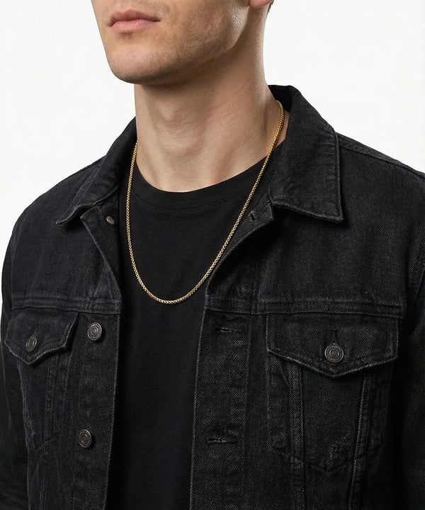 men's gold-toned stainless steel box chain necklace on model wearing black denim jacket
