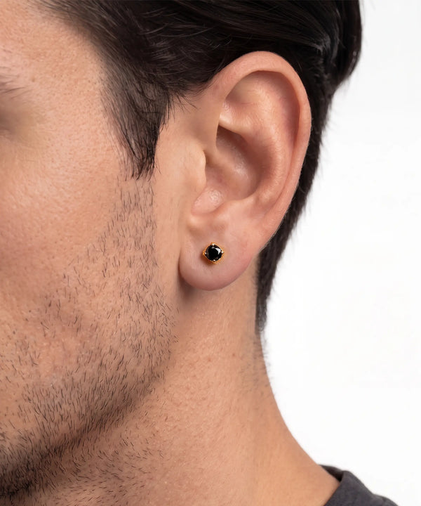 Front view of men's round black diamond stud earrings in vermeil