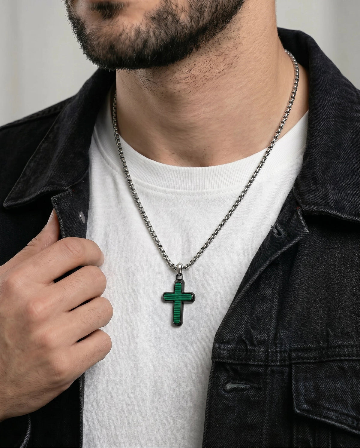 Close-up of synthetic malachite cross pendant