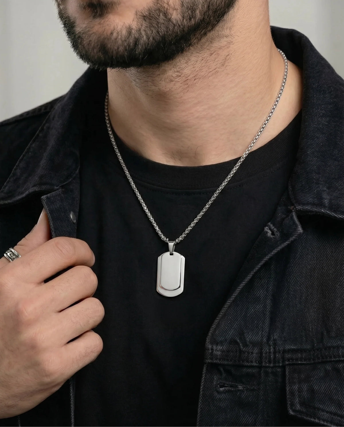 Close-up of classic dog tag pendant