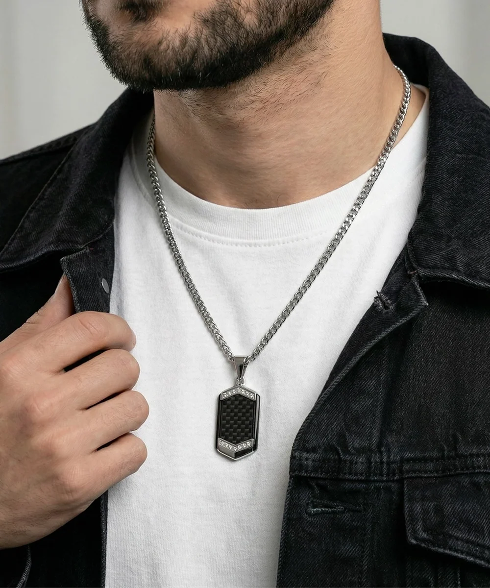 Close-up of cubic zirconia dog tag pendant