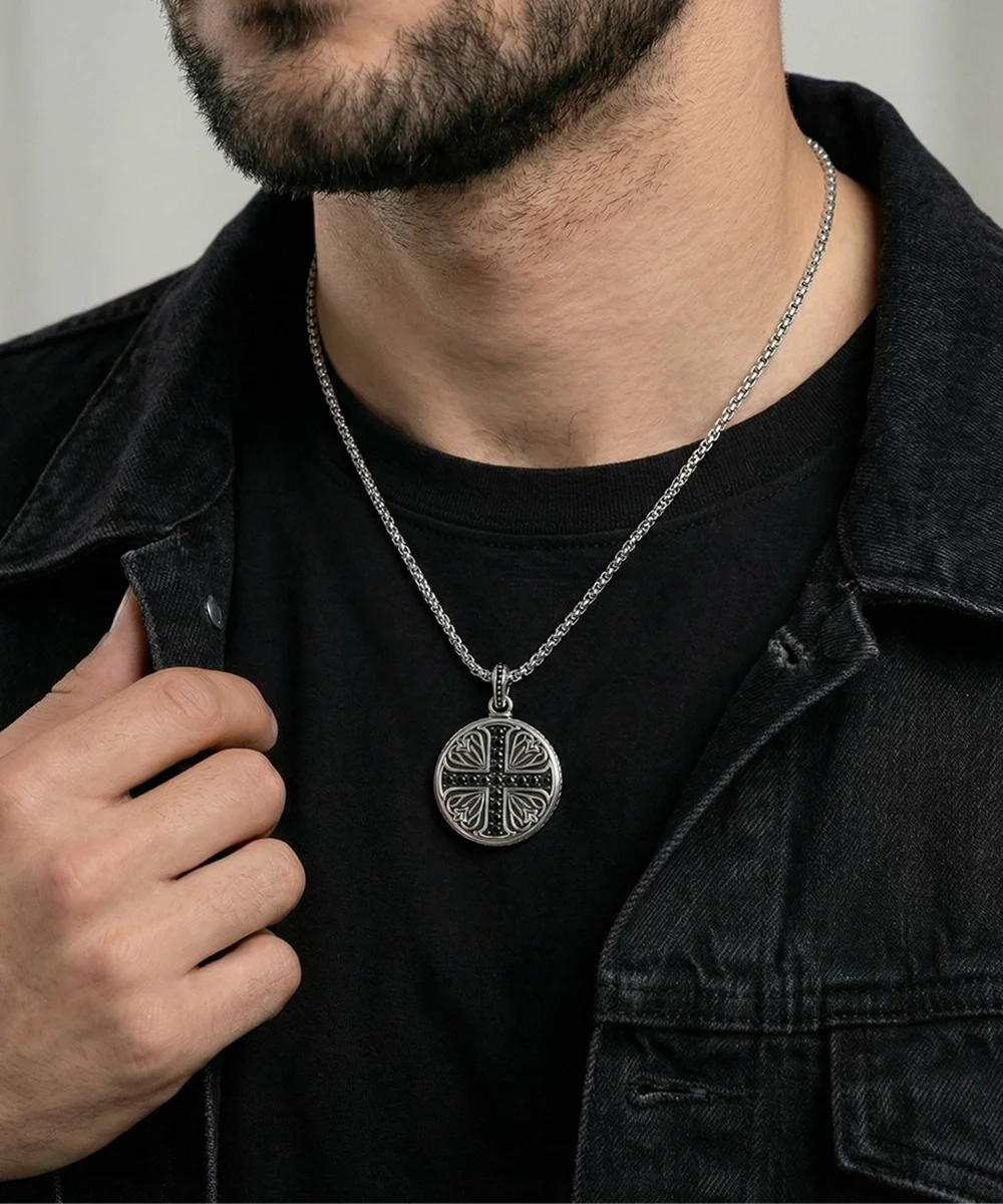 men's black cross pendant from Valliani Jewelers