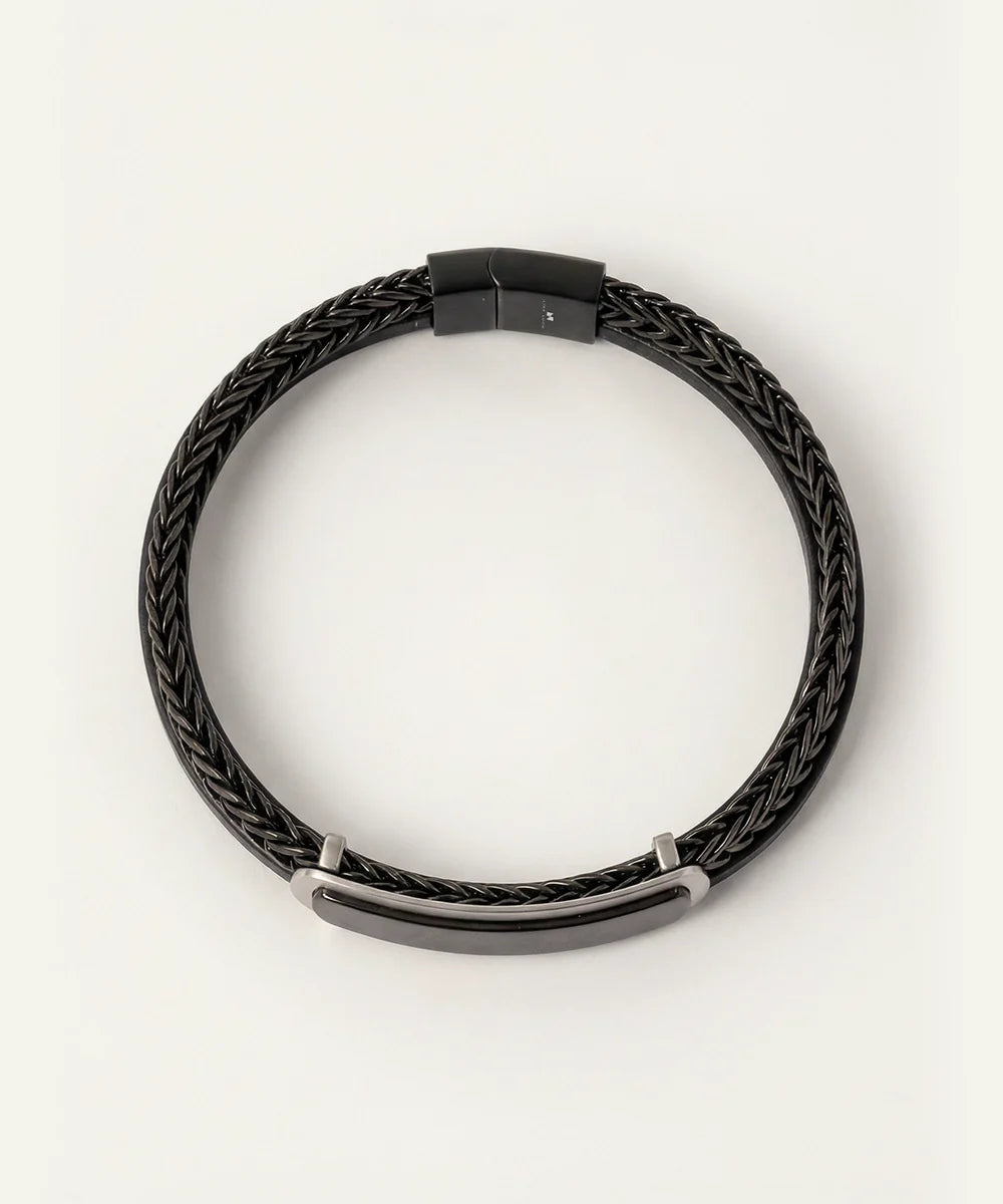 Black braided leather necklace on a white background