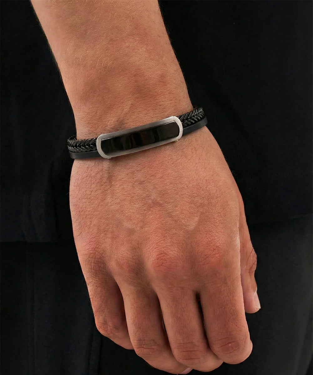 Close-up of layered leather bracelet for men