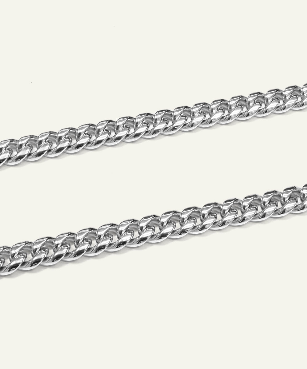 Close-up of silver-toned Cuban chain links