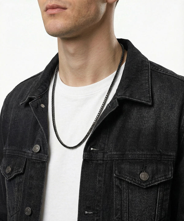 Close-up of black tennis necklace