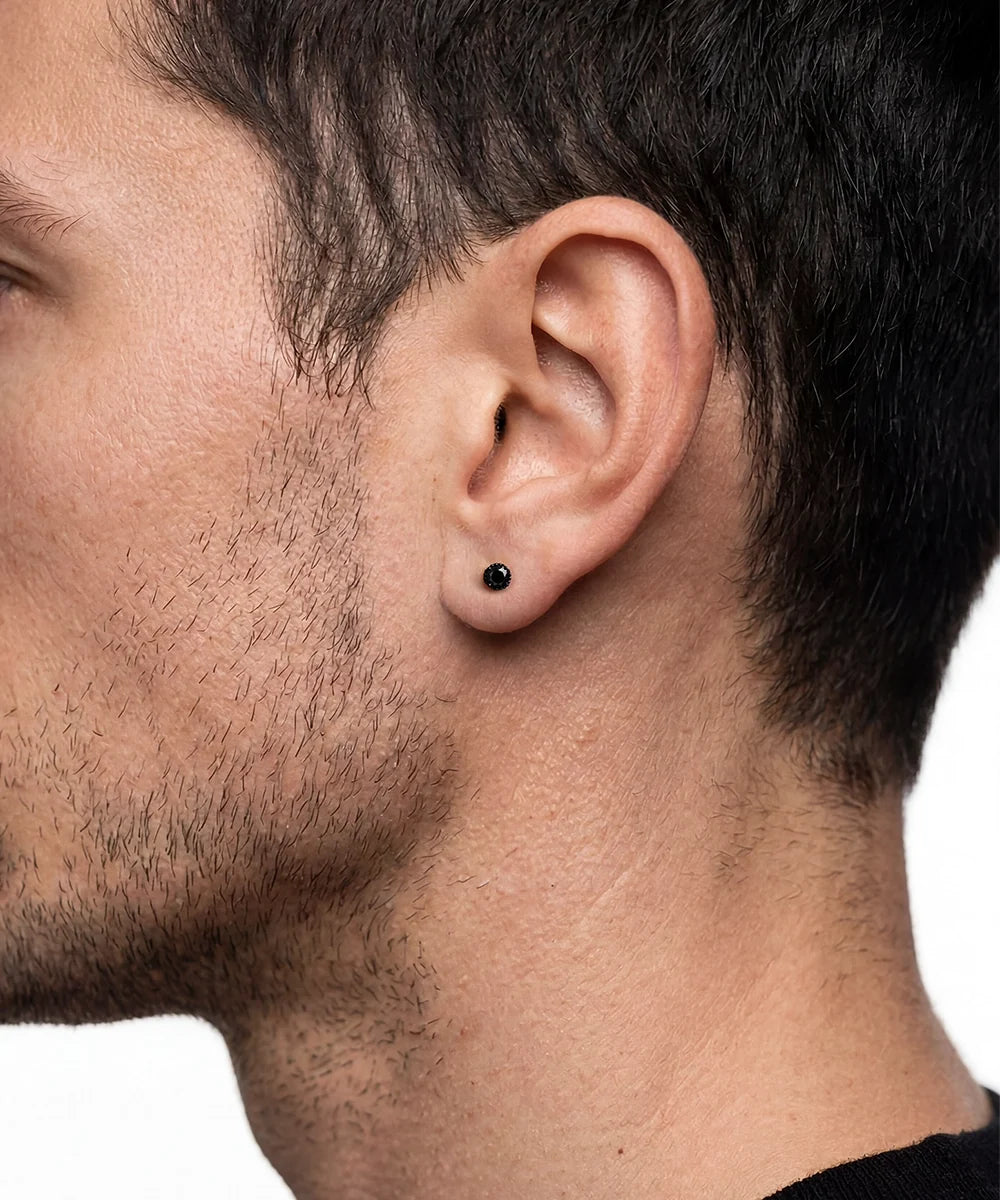 Side view of black diamond stud earrings