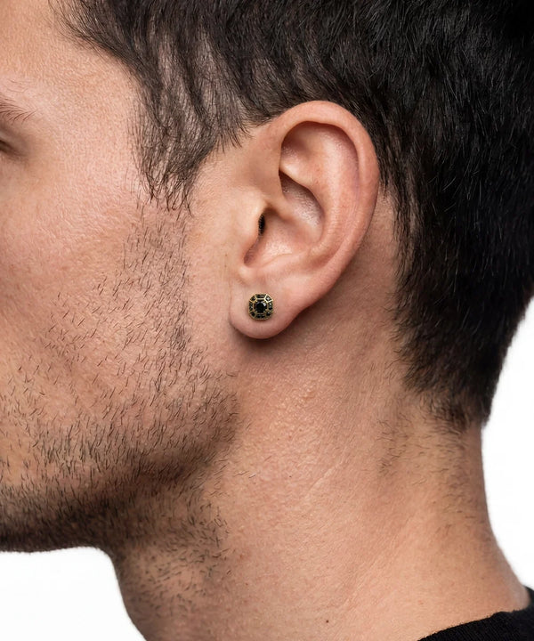 Side view of vermeil black diamond stud earrings
