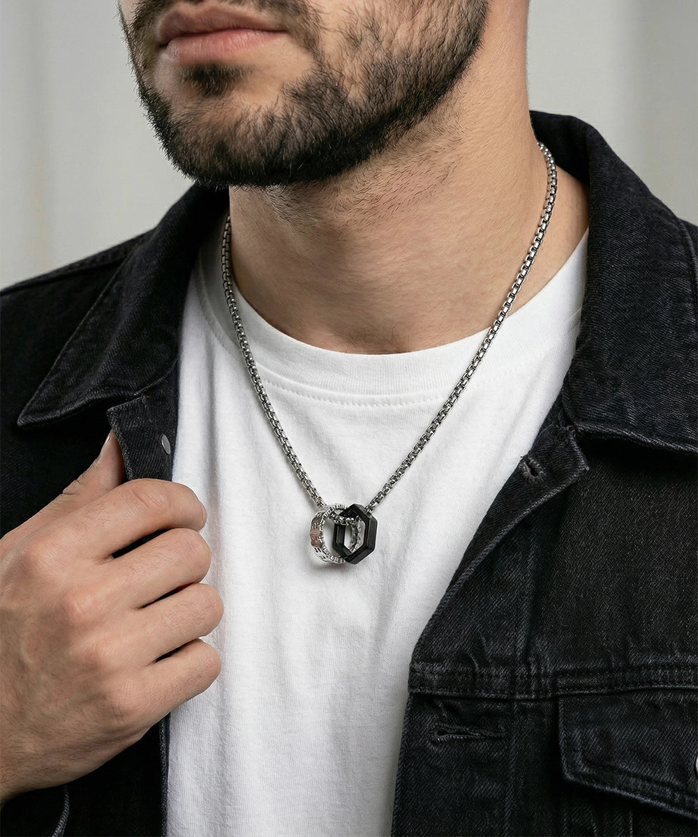Close-up of textured rings pendant