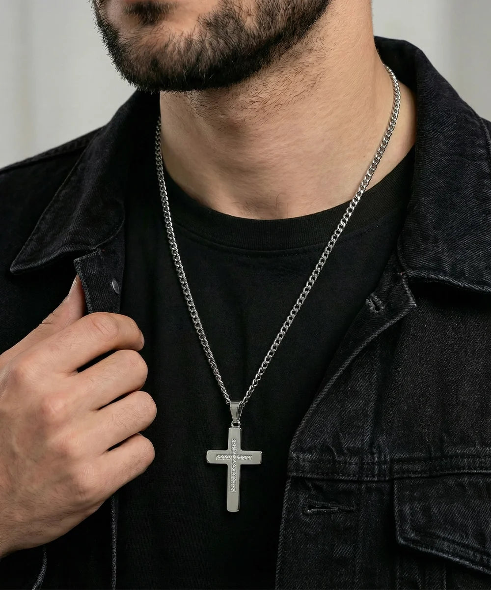 Close-up of white cubic zirconia cross pendant